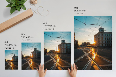 Poster The setting sun over the city with architecture