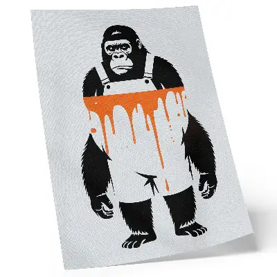 Decorative gorilla poster wearing overalls against a vibrant orange background