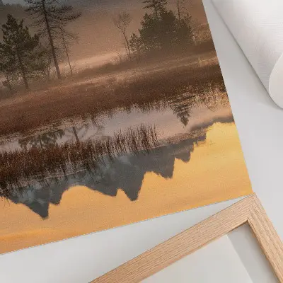 Art print featuring mountains, trees, and fog over calm reflected water