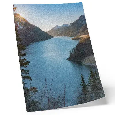 Poster majestic mountains and lake under the sun reflecting the harmony of nature