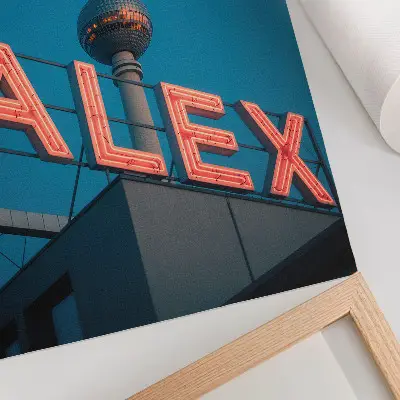 Premium wall art tower in a neon city during an evening sky contrast
