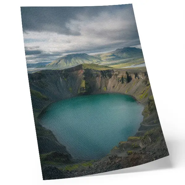Decorative poster featuring a turquoise lake with mountain and cloud scenery