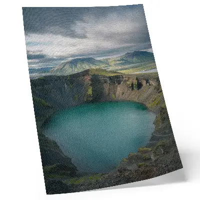 Decorative poster featuring a turquoise lake with mountain and cloud scenery