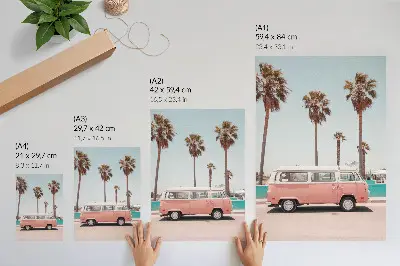 Premium wall art pink car under a blue sky with tall palm trees