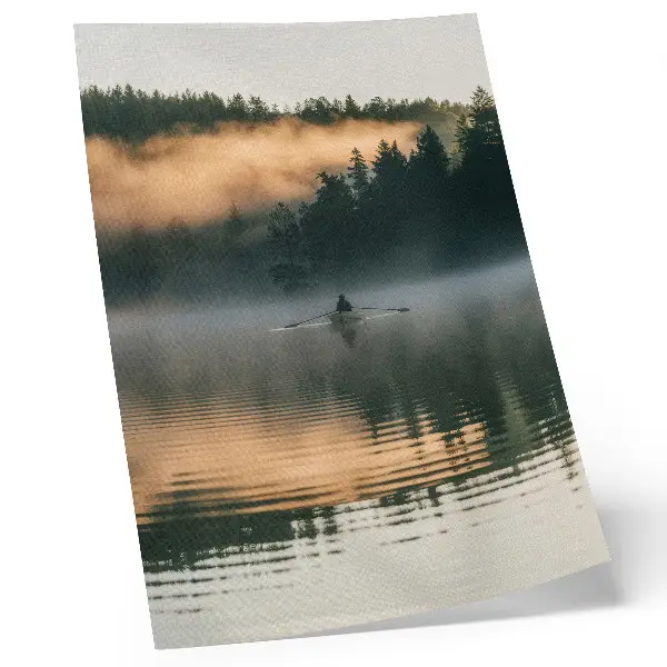 Art print foggy lake scene with a boat and green tree reflections