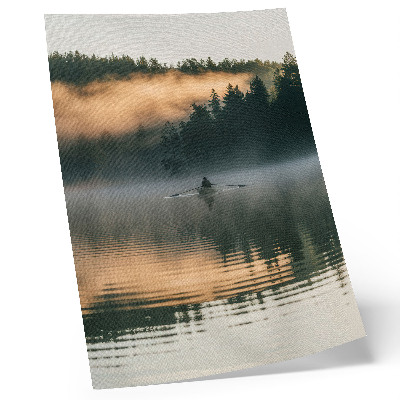 Art print foggy lake scene with a boat and green tree reflections