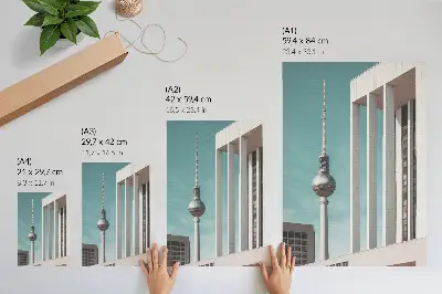 Decorative poster minimalist tower with modern buildings against a blue sky