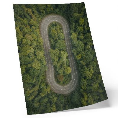 Decorative poster a narrow winding forest road