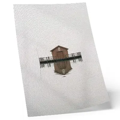 Decorative poster a wooden cottage in a minimalist style by the water