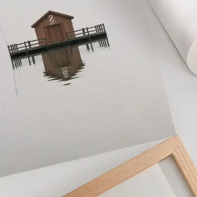 Decorative poster a wooden cottage in a minimalist style by the water