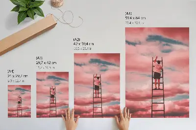 Premium wall art person on a ladder reaching into pink clouds in the sky