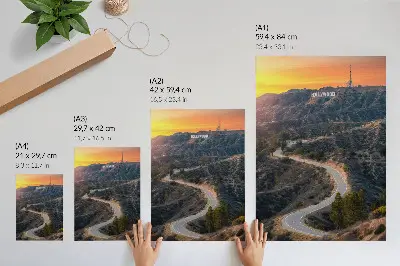 Decorative poster featuring hills, road, and sunset dreams inscription