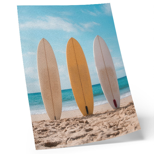 Art print Surfboards on the beach under a blue sky