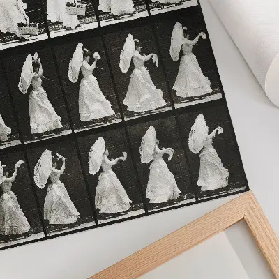 Woman Lifting a Basket, Waving a Handkerchief (1887) by Eadweard Muybridge poster