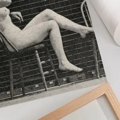 Art print Woman sitting naked in a chair smoking a cigarette by Eadweard Muybridge