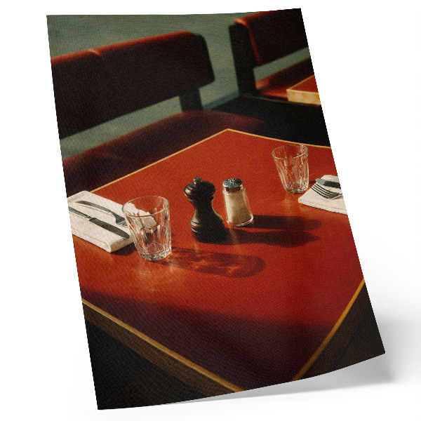 Decorative poster A table in a restaurant with spices and glassware