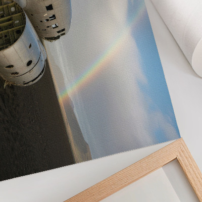 Decorative canvas print A metal plane wreck with a rainbow in the background.
