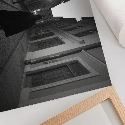 Decorative canvas print featuring a dark street scene with a mysterious figure in a nostalgic atmosphere