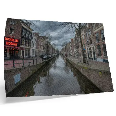 Poster featuring a canal with gentle architecture and an atmospheric sky