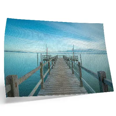 Photo canvas bridge over a lake with blue hues reflecting peace and simplicity