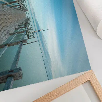 Photo canvas bridge over a lake with blue hues reflecting peace and simplicity