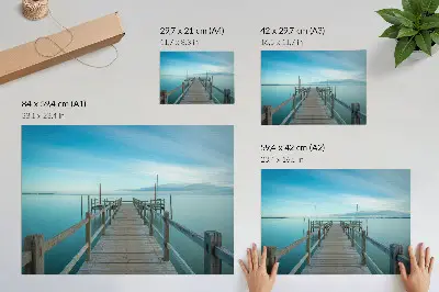 Photo canvas bridge over a lake with blue hues reflecting peace and simplicity