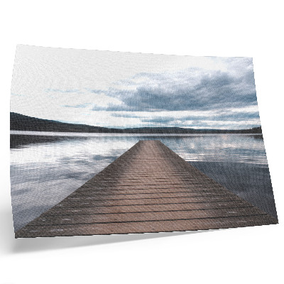Decorative canvas print A picturesque lakeside pier with a view of the mountains
