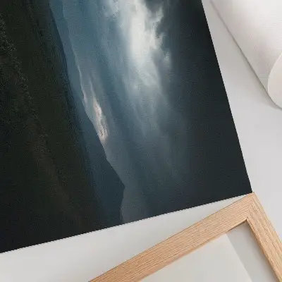 Photo canvas red umbrella against a landscape of dark mountains and clouds