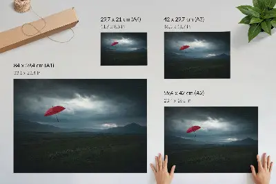Photo canvas red umbrella against a landscape of dark mountains and clouds