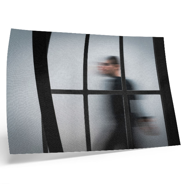 Decorative canvas print Black silhouette behind a glass frame, gray minimalism