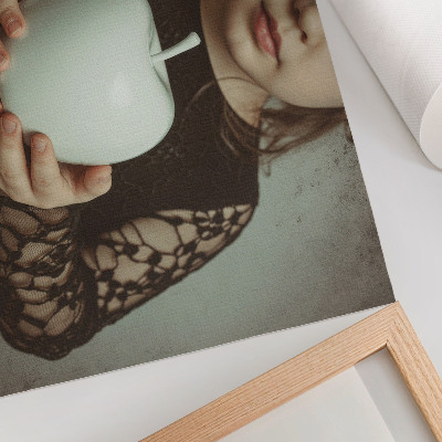 Decorative canvas print Girl with white fruit mysterious atmosphere