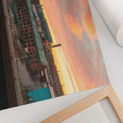 Decorative canvas print industrial buildings at sunset in a peaceful atmosphere