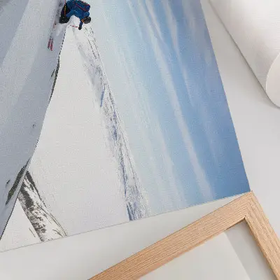 Photo canvas skier on white peaks under a blue sky