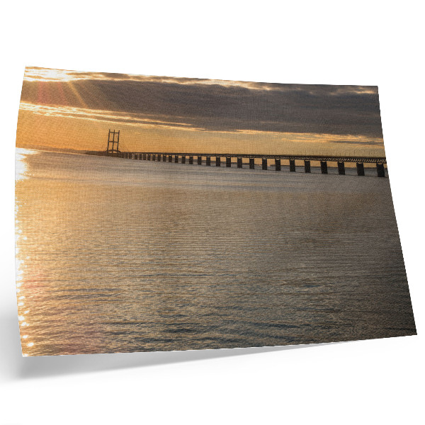 Poster A bridge on the horizon lit by the sun
