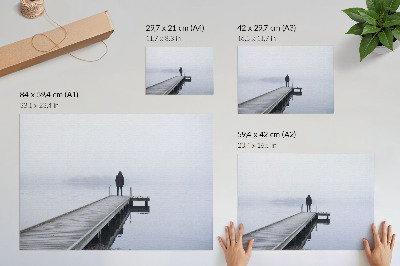 Photo canvas A lonely figure on a pier in the fog