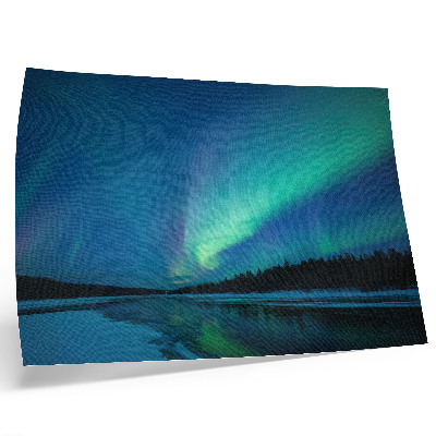 Photo canvas Aurora Borealis over a frozen lake at night