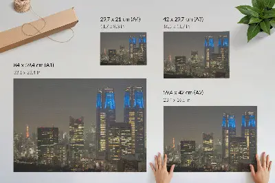 Decorative canvas print featuring skyscrapers and modern buildings illuminated at night