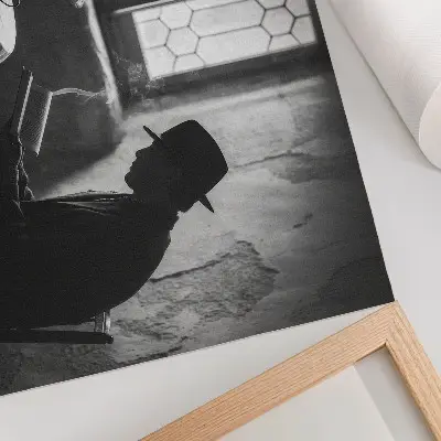 Poster black and white atmospheric man with a book in classic elegance