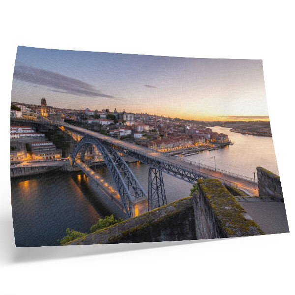 Decorative canvas print The bridge against the backdrop of the setting sun and the city