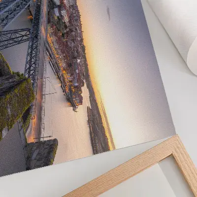 Decorative canvas print bridge at sunset with city skyline backdrop