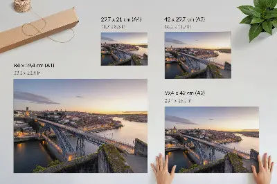 Decorative canvas print bridge at sunset with city skyline backdrop
