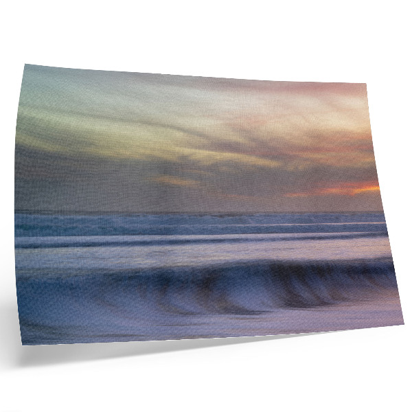 Photo canvas Pastel ocean waves and the setting sun