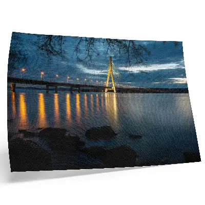 Illuminated bridge over the water at night decorative canvas print