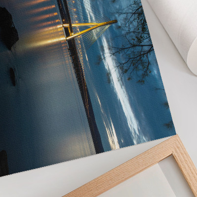 Decorative canvas print Illuminated bridge over the water at night
