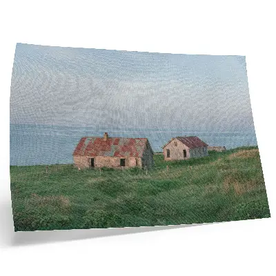 Poster rustic buildings with green meadows and sea