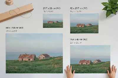 Poster rustic buildings with green meadows and sea