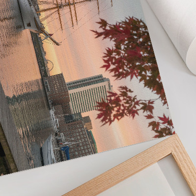 Decorative canvas print A sailing ship at sunset, a peaceful panorama of the city