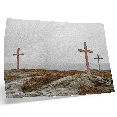 Poster three wooden crosses on a misty hill
