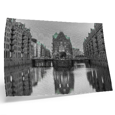 Poster Canal with industrial buildings, reflections in the water