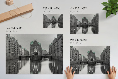 Poster Canal with industrial buildings, reflections in the water